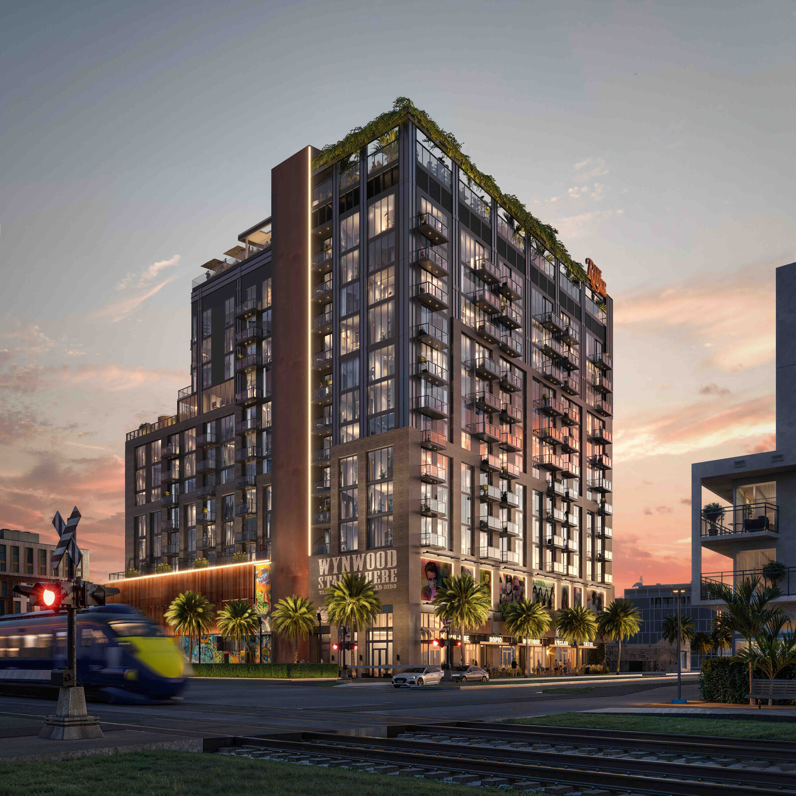 The Rider Wynwood luxury condominium tower at dusk